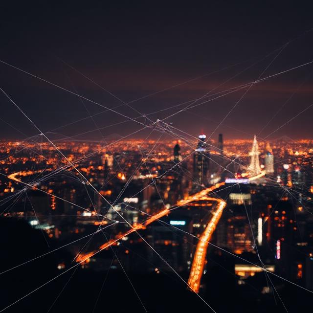 “Circuit traces blending into a night skyline.”